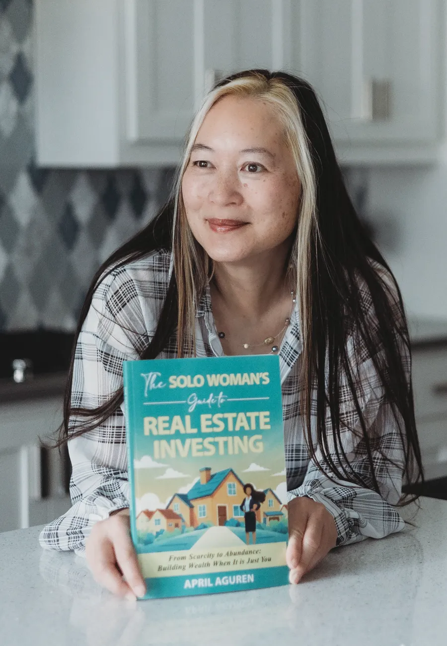 April Aguren with her book